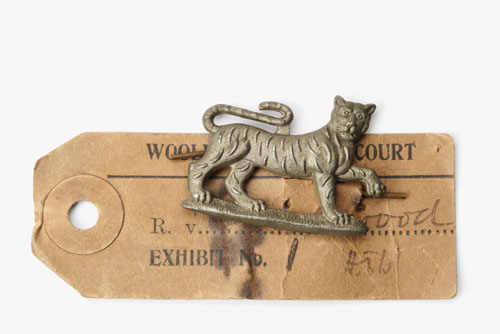 The badge of the Leicestershire Regiment that helped to convict David Greenwood of murder, 1918. Greenwood was convicted of raping and murdering 16 year old girl, Nellie Trew in February 1918. This badge was found at the crime scene. He denied having met Nellie but was found guilty and sentenced to death, commuted to life imprisonment. He was released in 1933 aged 36. But was he guilty of the crime? © Museum of London / object courtesy the Metropolitan Police’s Crime Museum